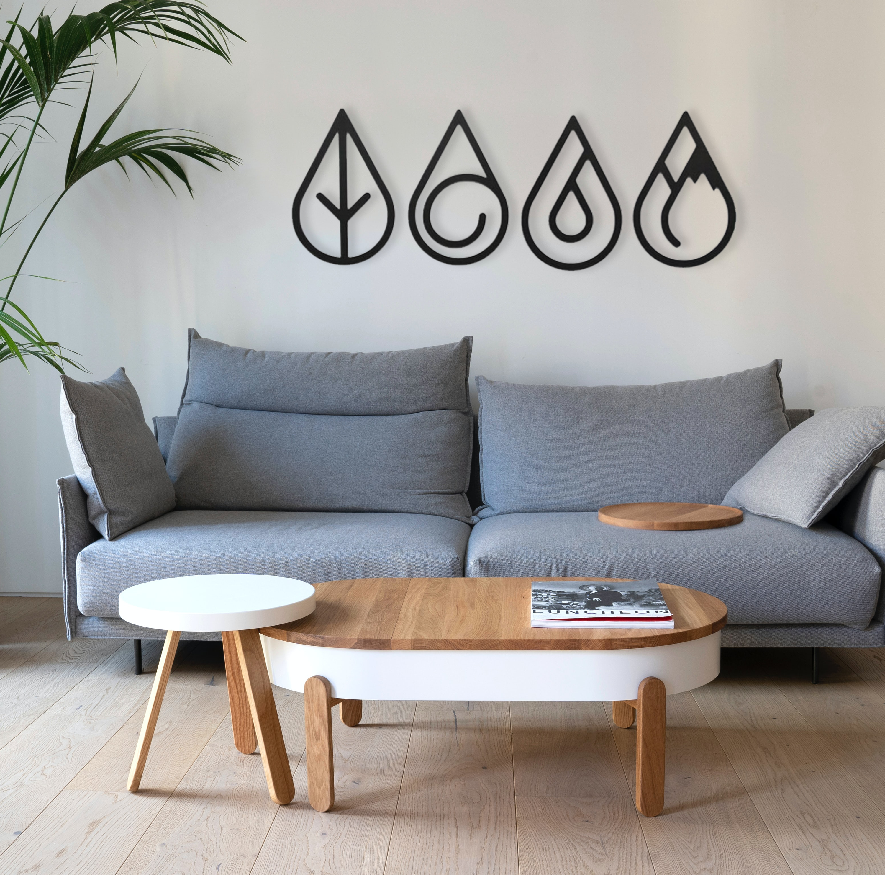 Four Elements Round Metal Wall Art featuring Earth, Wind, Water, and Fire symbols, crafted from durable 16 gauge steel with a low gloss finish.