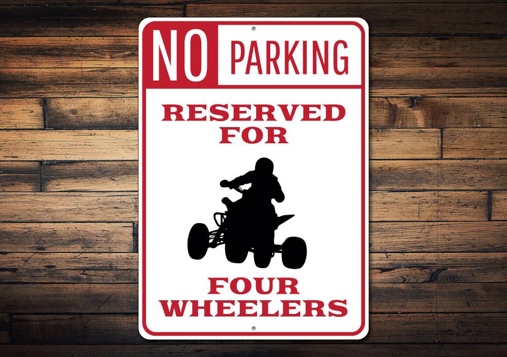 Four Wheeler Parking Sign made of high-quality aluminum with customizable text and unique designs for various vehicles.