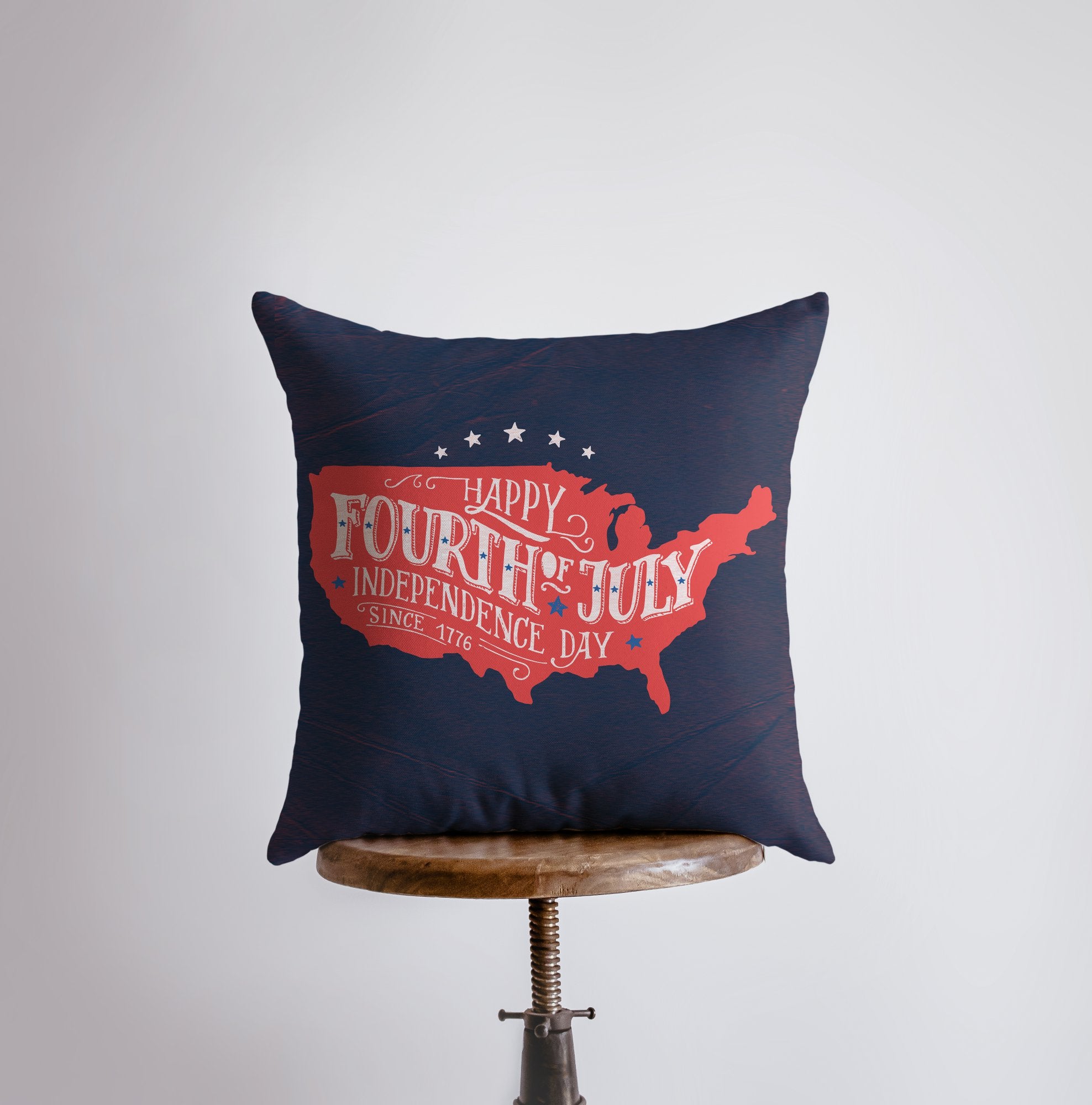 Double-sided Fourth of July pillow cover featuring red USA outline and navy vintage star pattern, perfect for home decor.