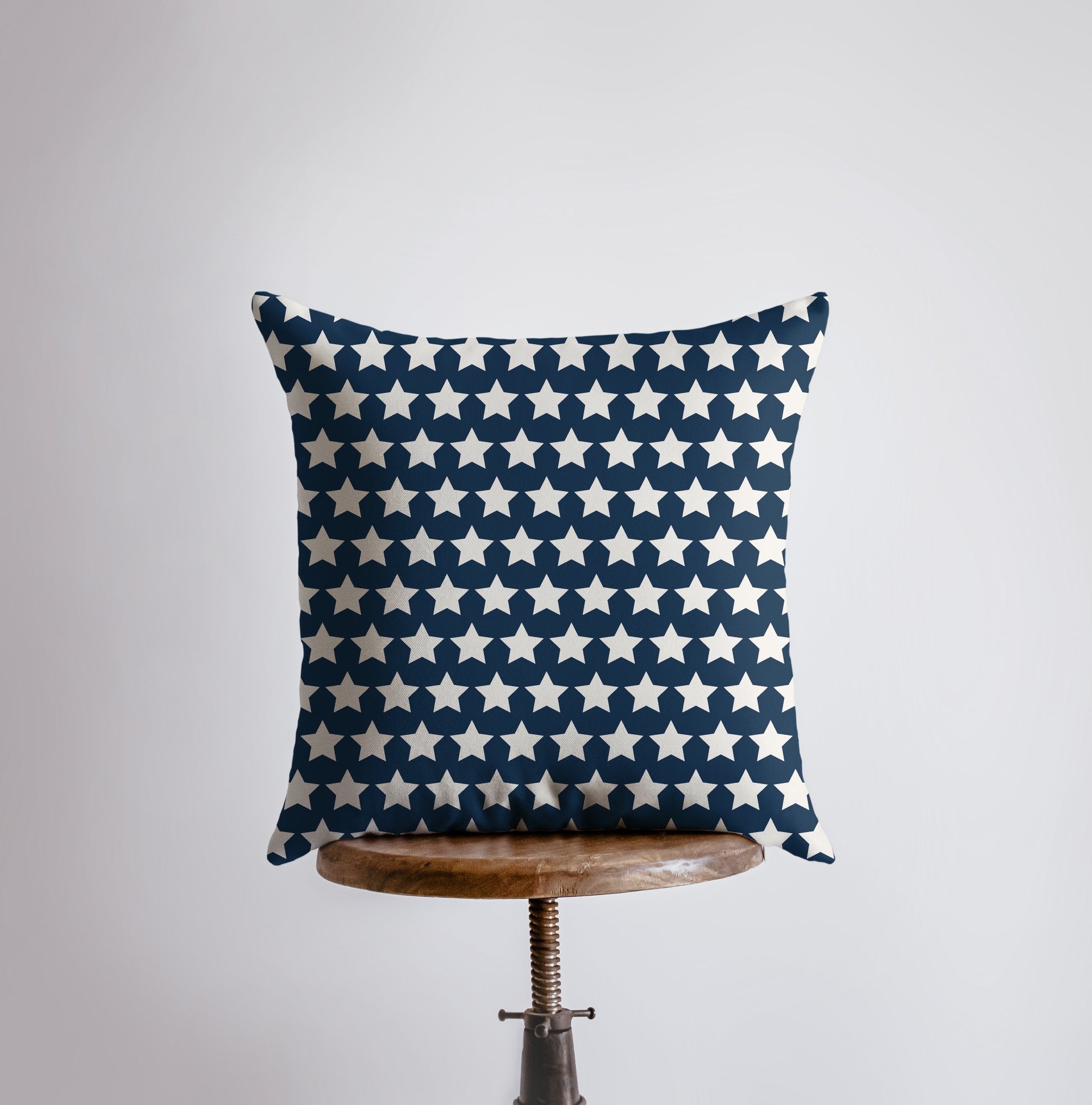 Double-sided Fourth of July pillow cover featuring red USA outline and navy vintage star pattern, perfect for home decor.