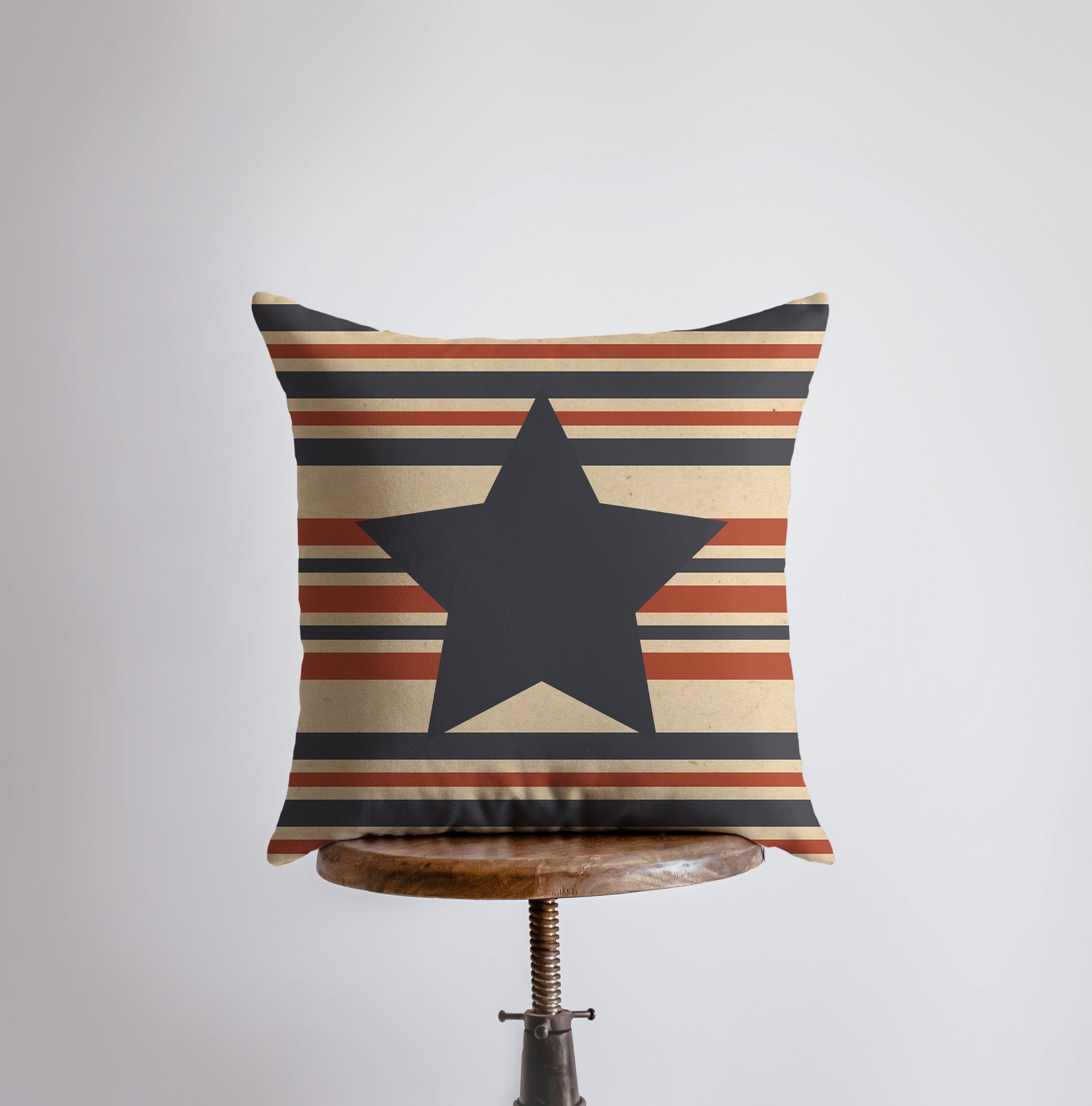 Handmade Fourth of July pillow cover featuring vintage red, white, and blue stripes and stars, perfect for patriotic home decor.