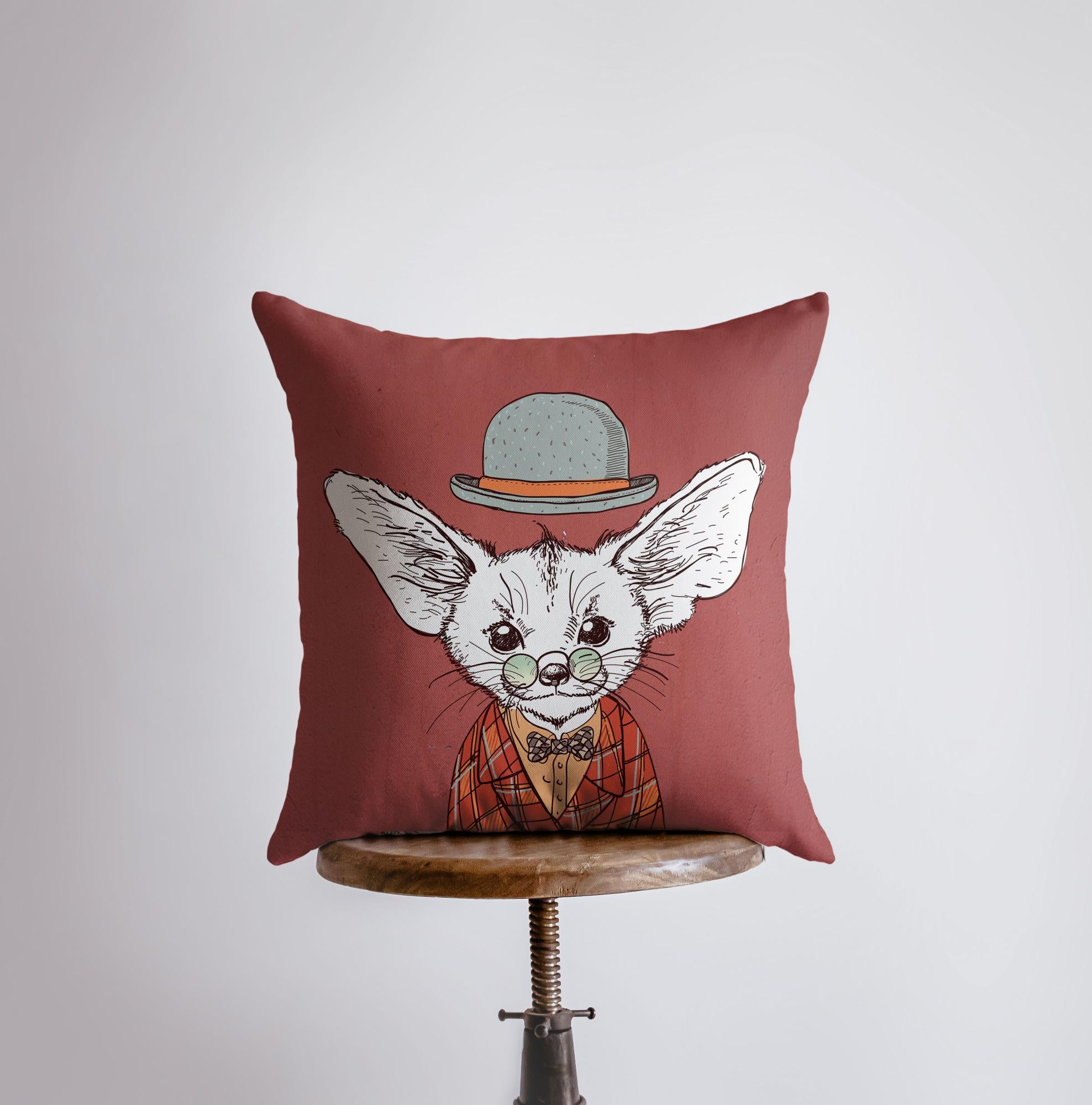 A vibrant fox pillow cover featuring an artist-sketched desert fox design, perfect for home decor.