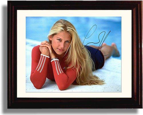 Framed glossy print of Anna Kournikova, showcasing her iconic tennis pose, perfect for sports enthusiasts.