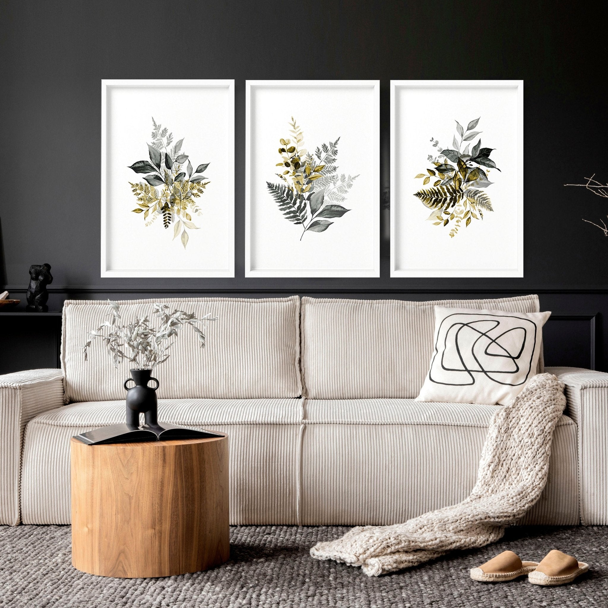 Set of 3 framed watercolor botanical prints showcasing intricate nature illustrations in soft colors, perfect for living room decor.