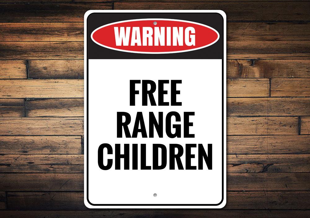 A decorative Free Range Children Sign made of high-quality aluminum, featuring playful typography and vibrant colors, perfect for home decor.