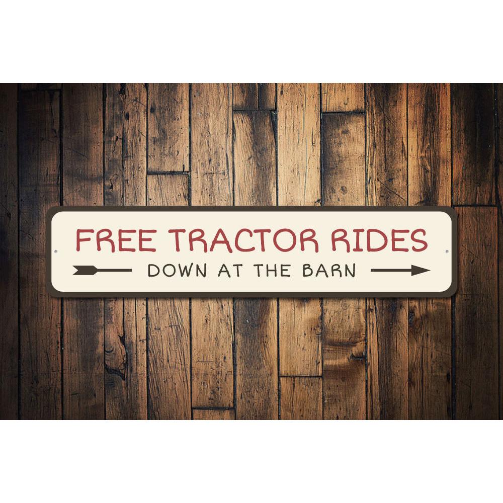 A decorative Free Tractor Rides Sign made of high-quality aluminum, featuring vibrant colors and a rustic design, perfect for indoor or outdoor display.