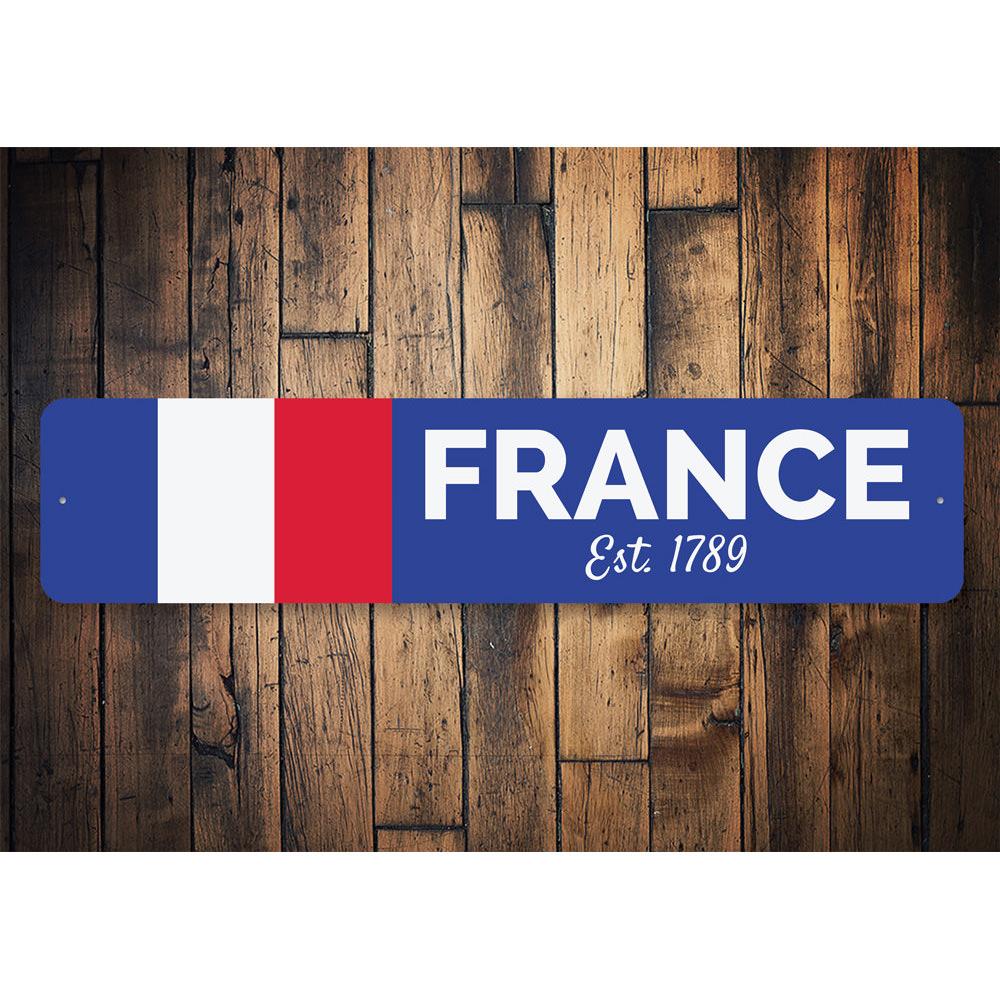 A decorative French Flag Sign made of high-quality aluminum, featuring vibrant colors and a sleek design, perfect for wall decor.