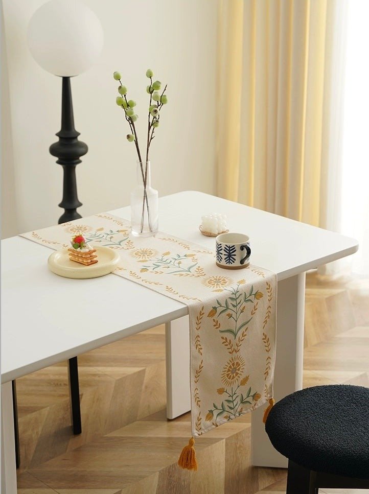 Elegant French style floral table runner featuring vibrant colors and intricate floral patterns, perfect for enhancing dining decor.