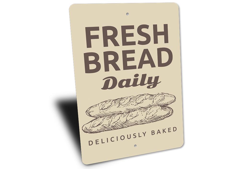 A decorative Fresh Bread Sign made of high-quality aluminum, featuring a rustic design suitable for bakeries and cafes.