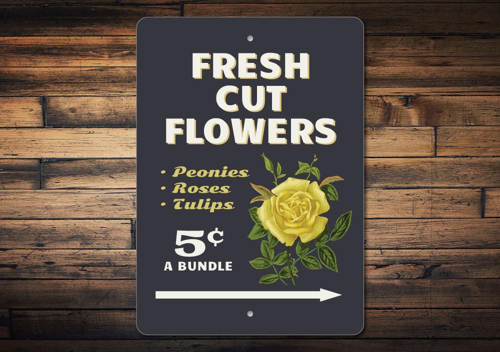 A decorative Fresh Cut Flowers Sign made of high-quality aluminum, featuring vibrant floral graphics, perfect for home decor.