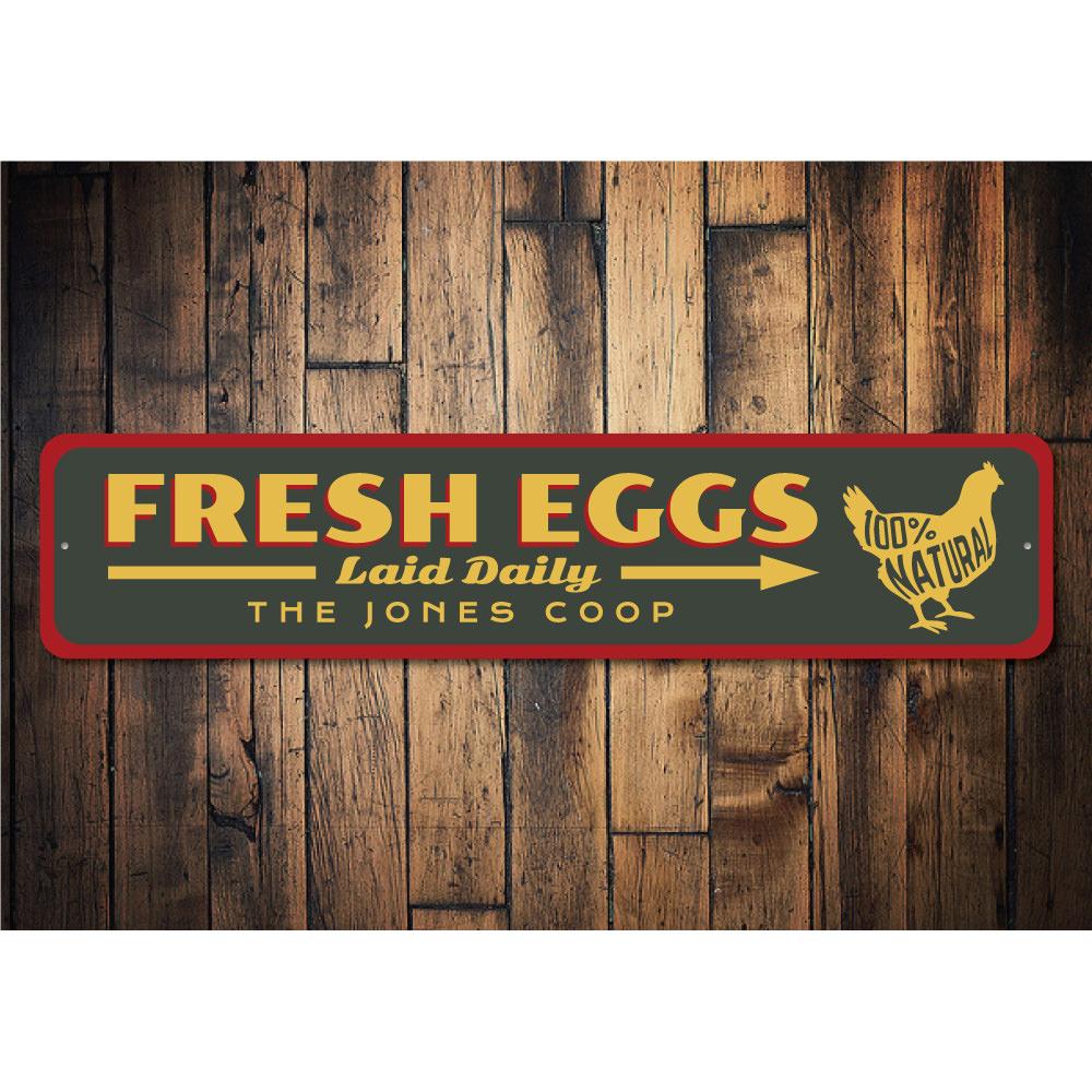 Fresh Eggs Laid Daily Sign made of durable aluminum, featuring a rustic design perfect for kitchen or garden decor.