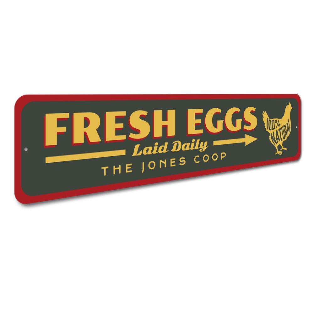 Fresh Eggs Laid Daily Sign made of durable aluminum, featuring a rustic design perfect for kitchen or garden decor.