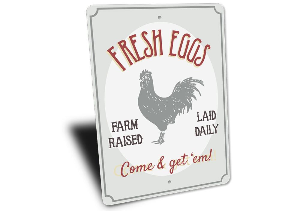 Fresh Farm Raised Eggs Sign made of durable aluminum, featuring a rustic design perfect for home decor.