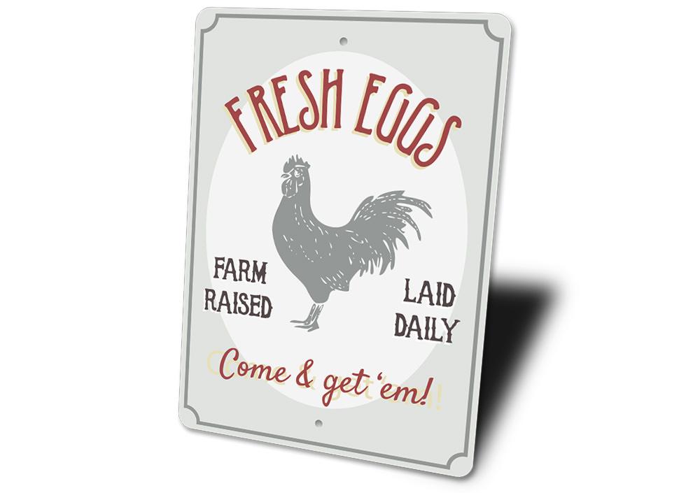 Fresh Farm Raised Eggs Sign made of durable aluminum, featuring a rustic design perfect for home decor.