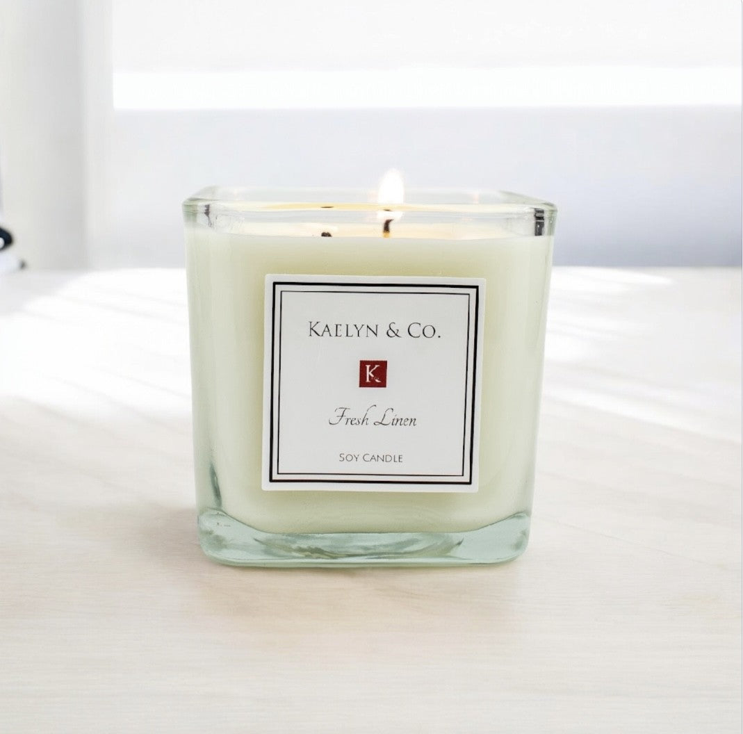 Fresh Linen Medium Cube Candle in elegant cube shape, showcasing its clean design and double wick feature.