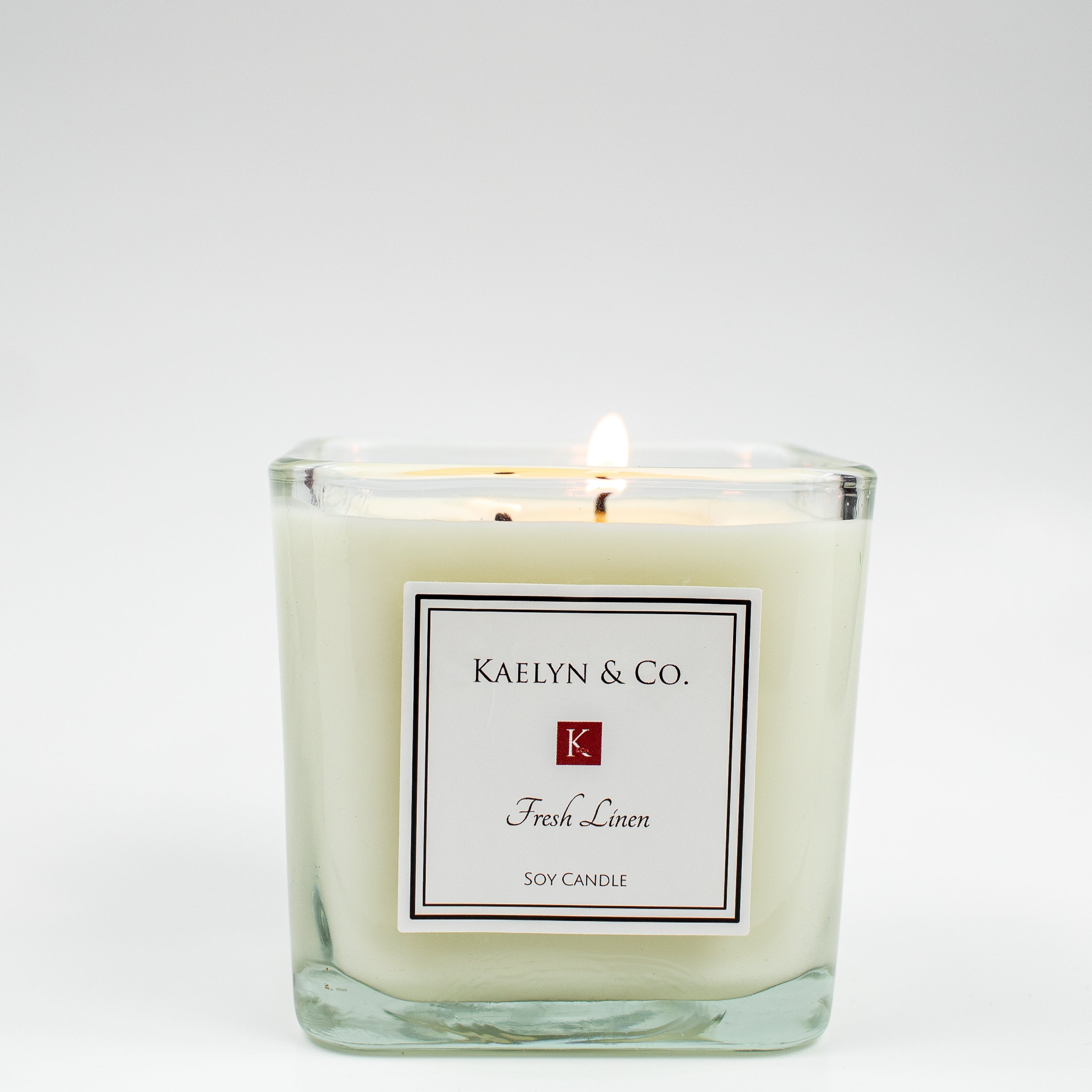 Fresh Linen Medium Cube Candle in elegant cube shape, showcasing its clean design and double wick feature.