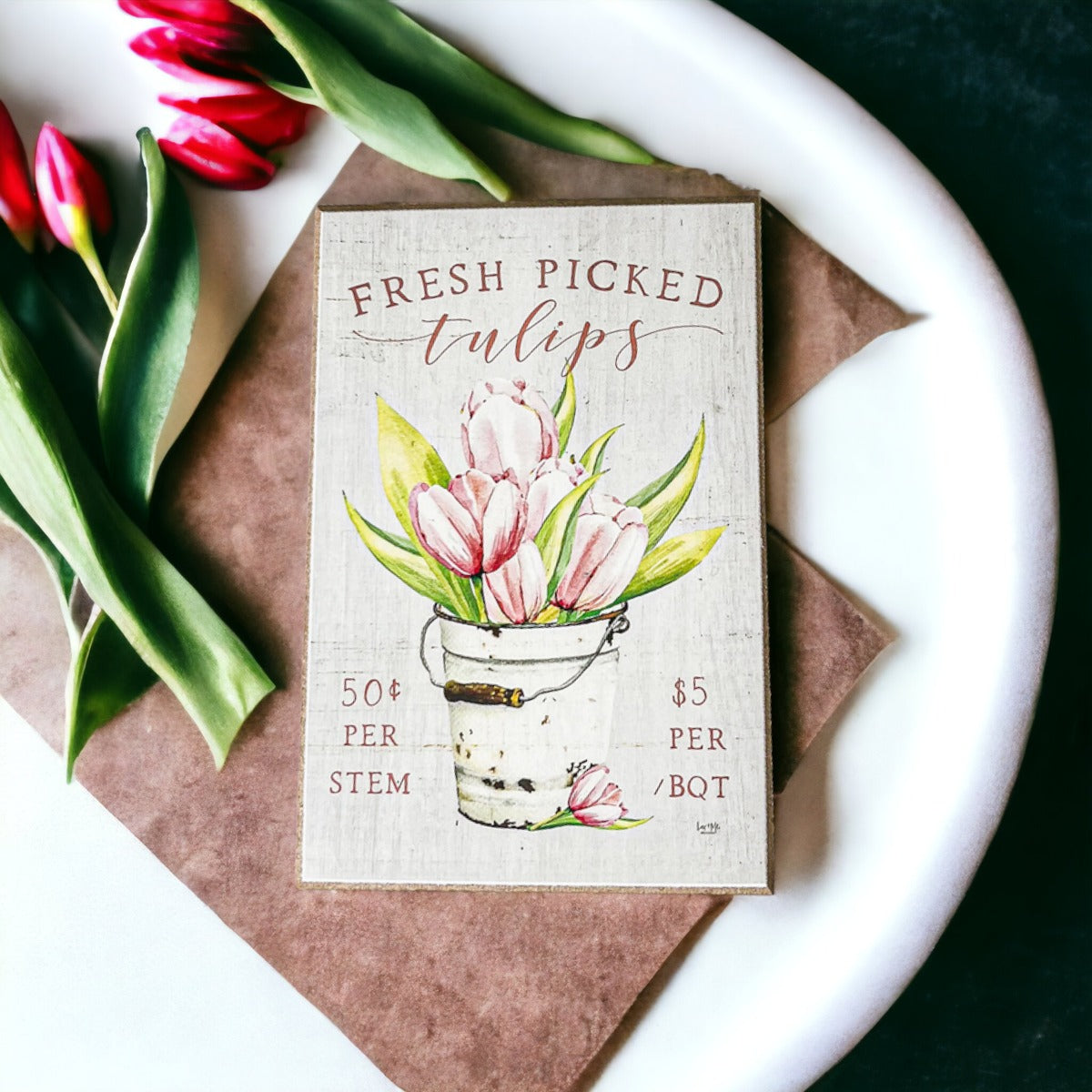 A charming wooden block sign featuring fresh tulips, perfect for spring and summer home decor.