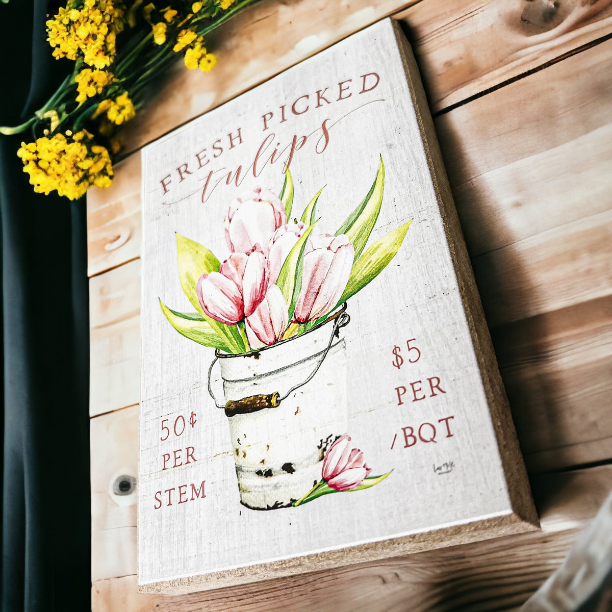 A charming wooden block sign featuring fresh tulips, perfect for spring and summer home decor.