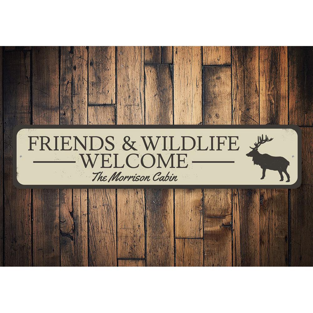 A decorative Friends & Wildlife Welcome Sign made of high-quality aluminum, featuring a rustic design suitable for lakehouses.