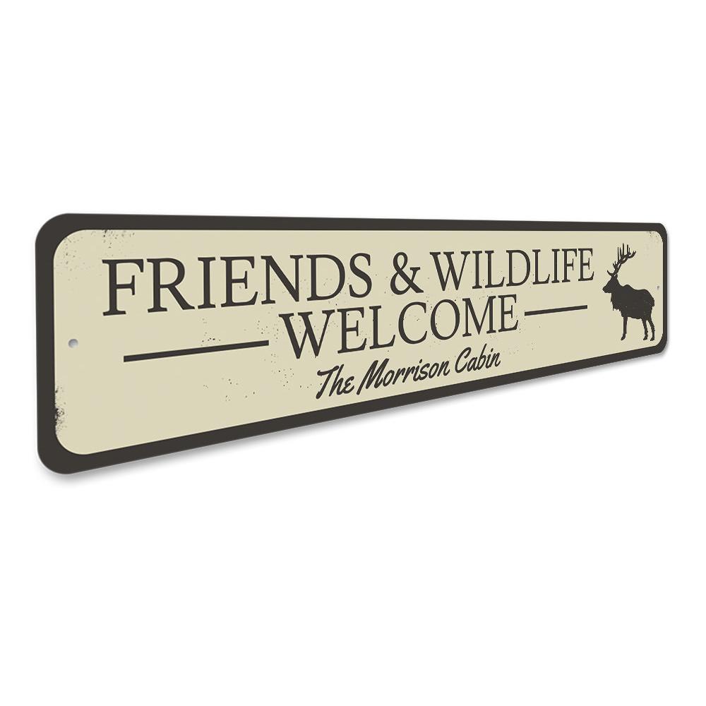 A decorative Friends & Wildlife Welcome Sign made of high-quality aluminum, featuring a rustic design suitable for lakehouses.