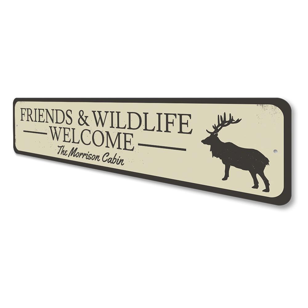 A decorative Friends & Wildlife Welcome Sign made of high-quality aluminum, featuring a rustic design suitable for lakehouses.