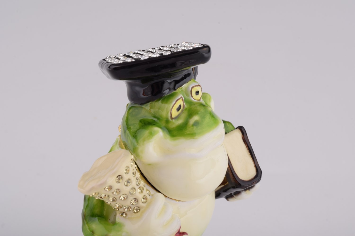 Handmade Frog Graduating Student trinket box with enamel finish and Austrian crystals, featuring a secure magnetic fastener.