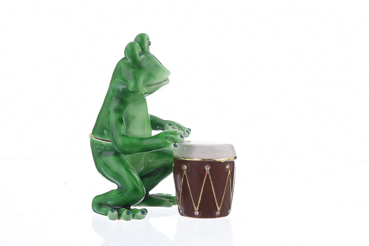 A beautifully crafted Frog Playing Drums jewelry box, featuring vibrant enamel and sparkling Austrian crystals, handmade by Keren Kopal.