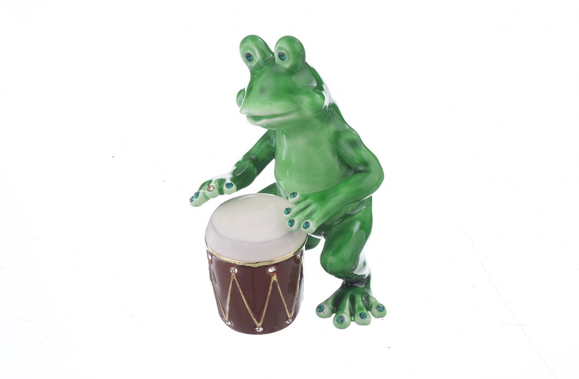 A beautifully crafted Frog Playing Drums jewelry box, featuring vibrant enamel and sparkling Austrian crystals, handmade by Keren Kopal.