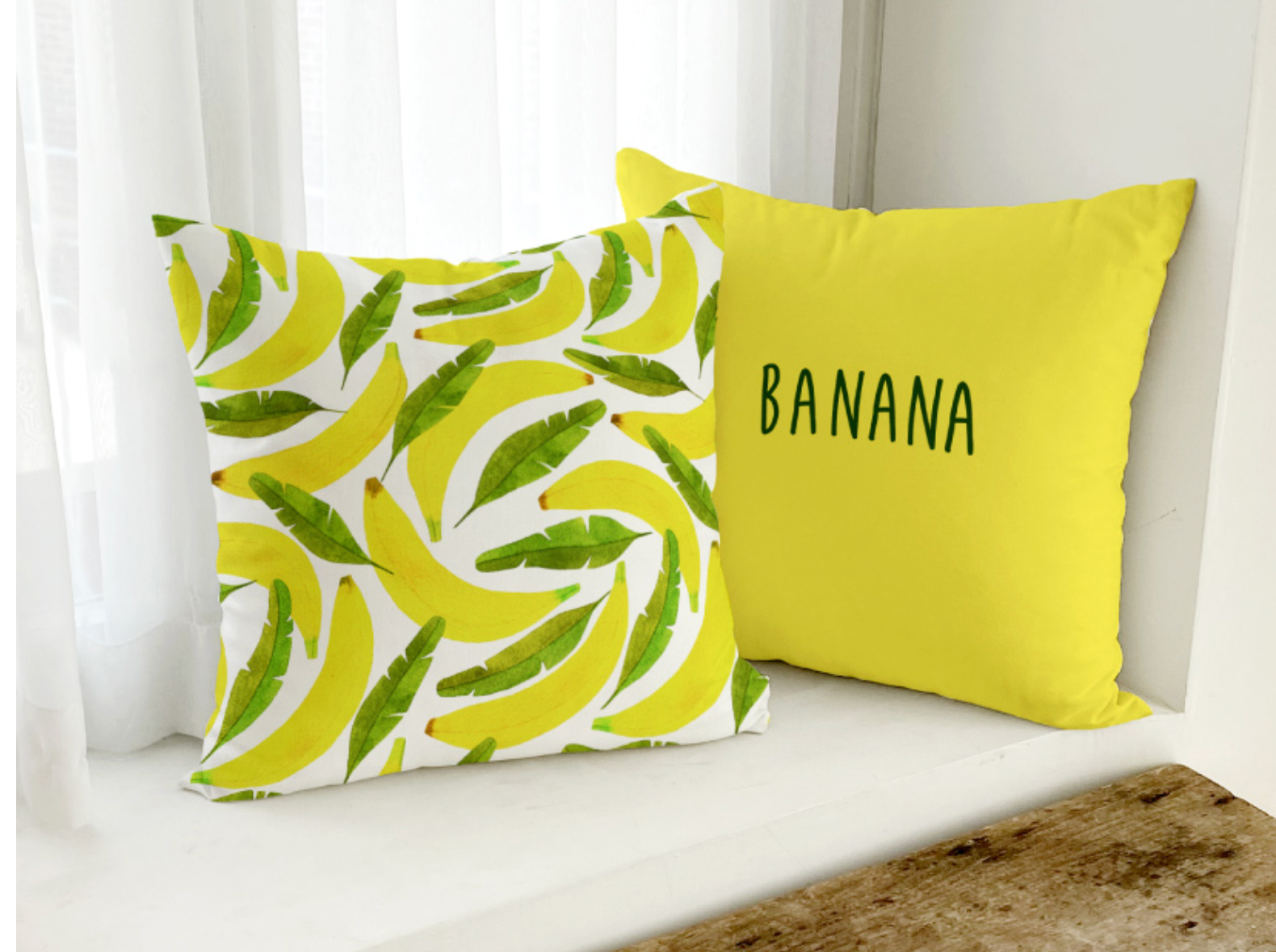 A vibrant Banana cushion featuring a double-sided design, showcasing a playful banana print and soft microfiber material.