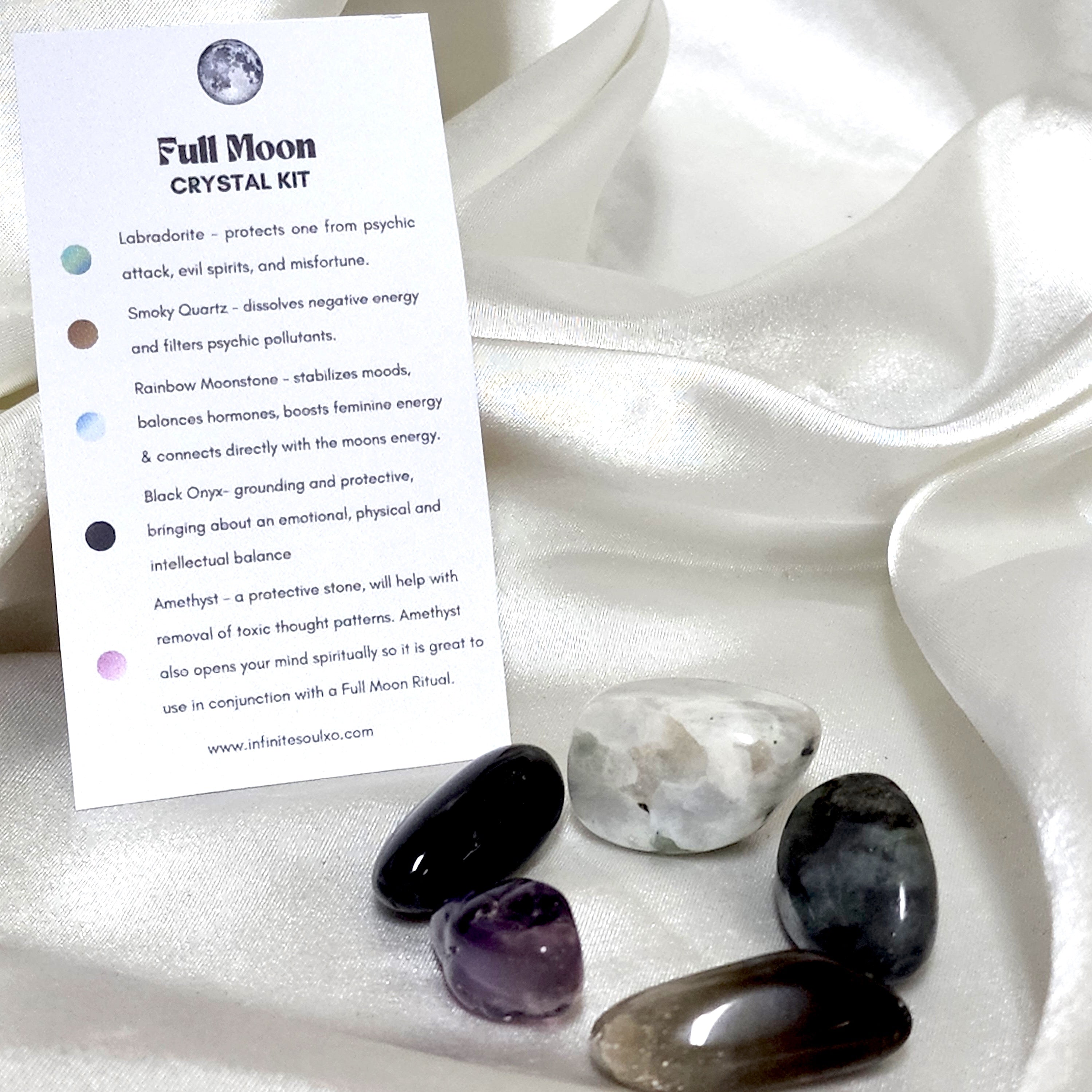 Full Moon Crystal Kit featuring Smoky Quartz, Black Onyx, Amethyst, Rainbow Moonstone, and Labradorite, arranged aesthetically.