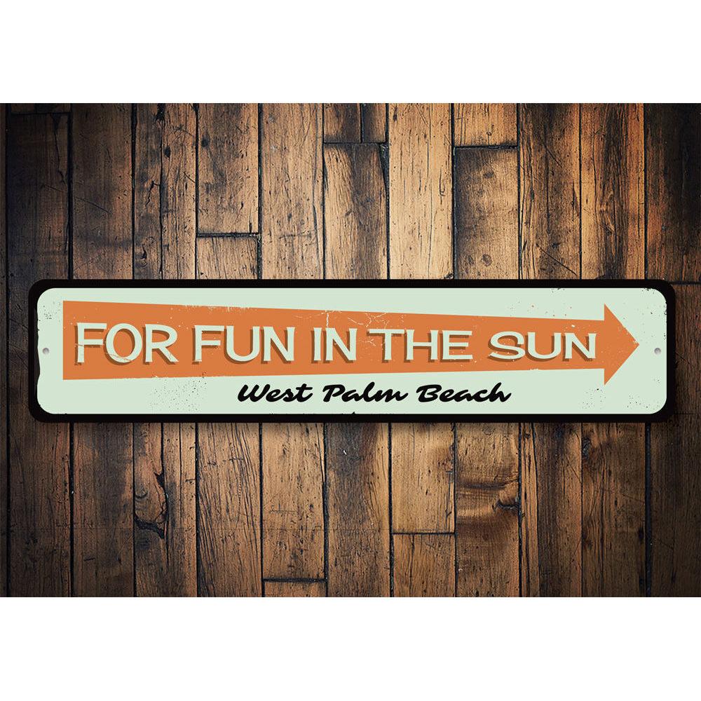 A vibrant Fun in the Sun Sign made of aluminum, featuring beach-themed graphics, perfect for coastal decor.