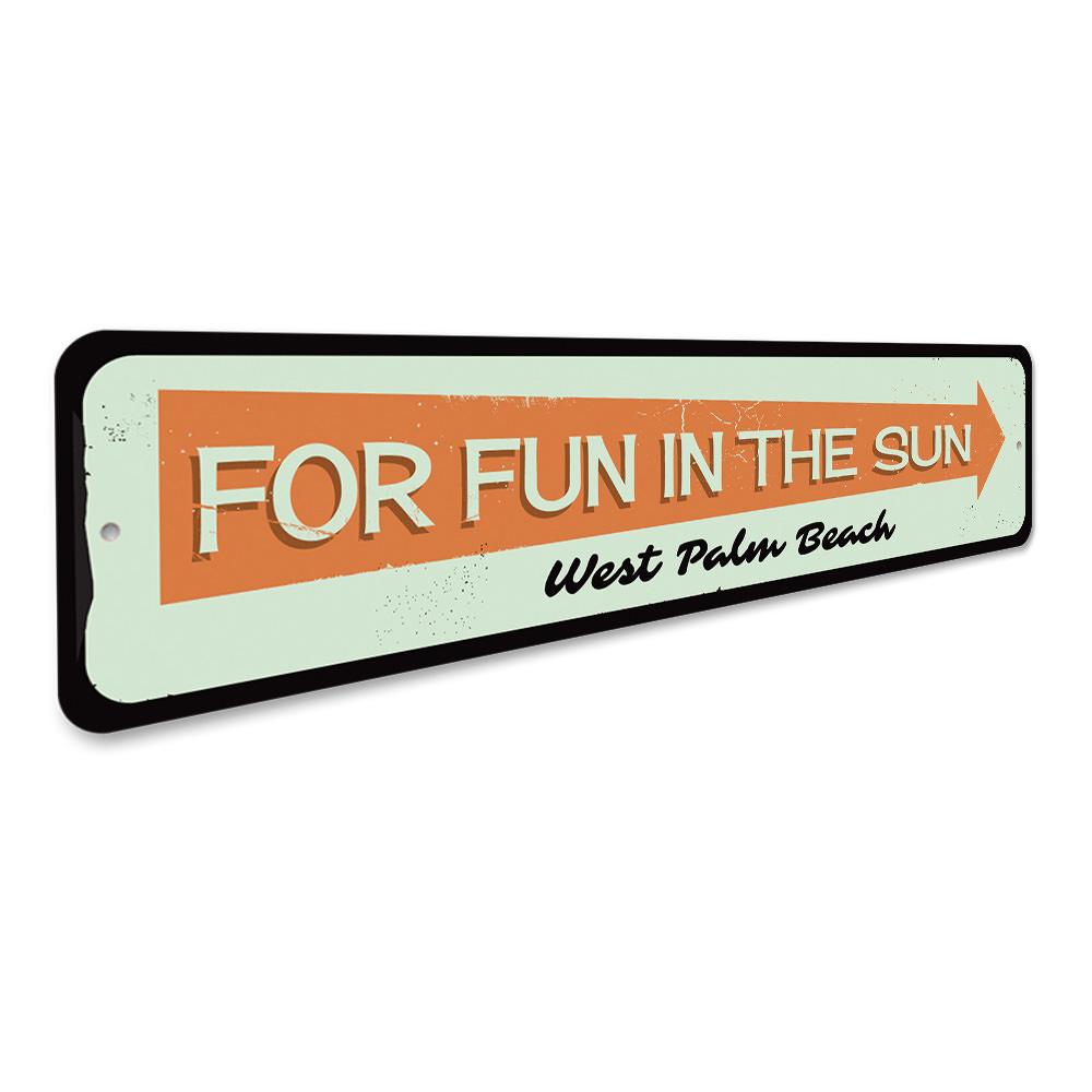 A vibrant Fun in the Sun Sign made of aluminum, featuring beach-themed graphics, perfect for coastal decor.