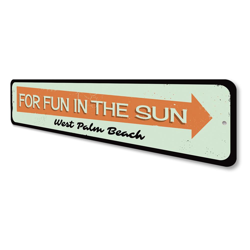 A vibrant Fun in the Sun Sign made of aluminum, featuring beach-themed graphics, perfect for coastal decor.