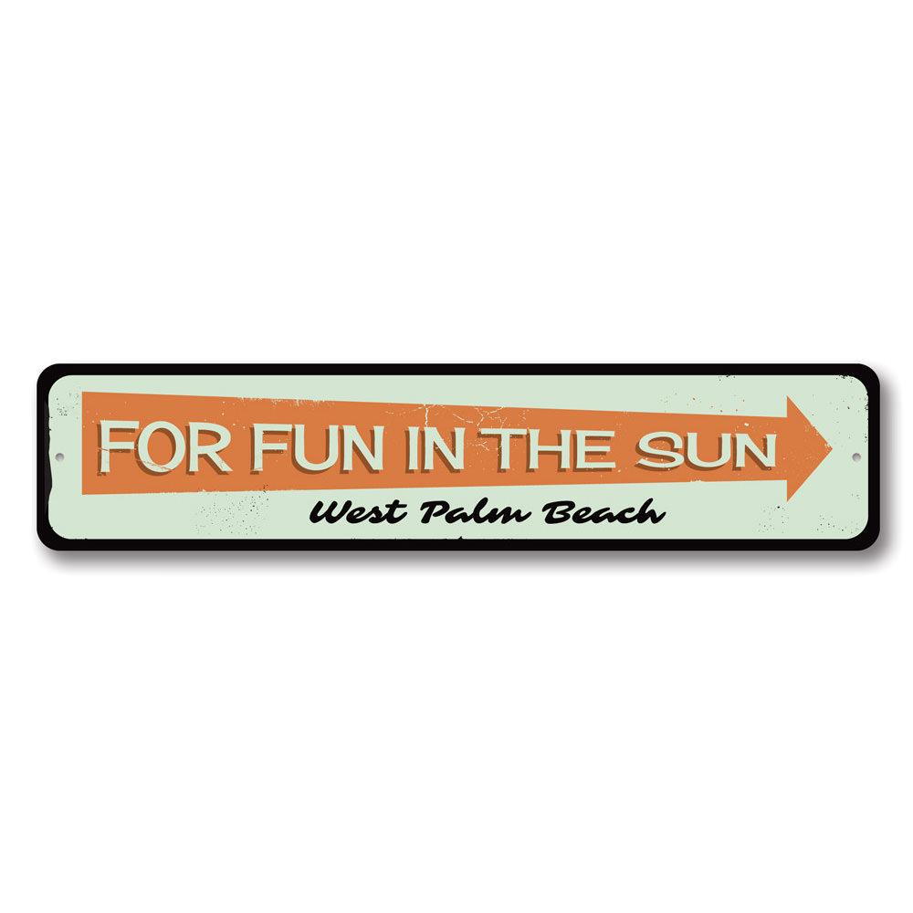 A vibrant Fun in the Sun Sign made of aluminum, featuring beach-themed graphics, perfect for coastal decor.