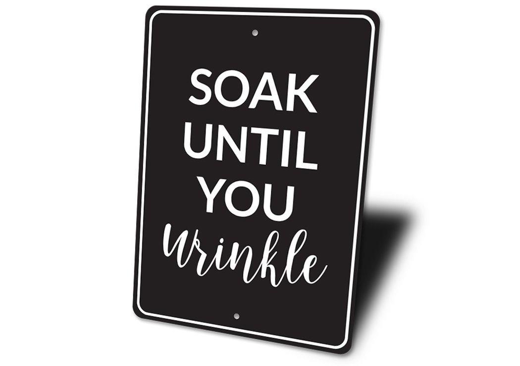 A humorous bathroom sign made of high-quality aluminum, featuring a funny quote, designed for wall decor.