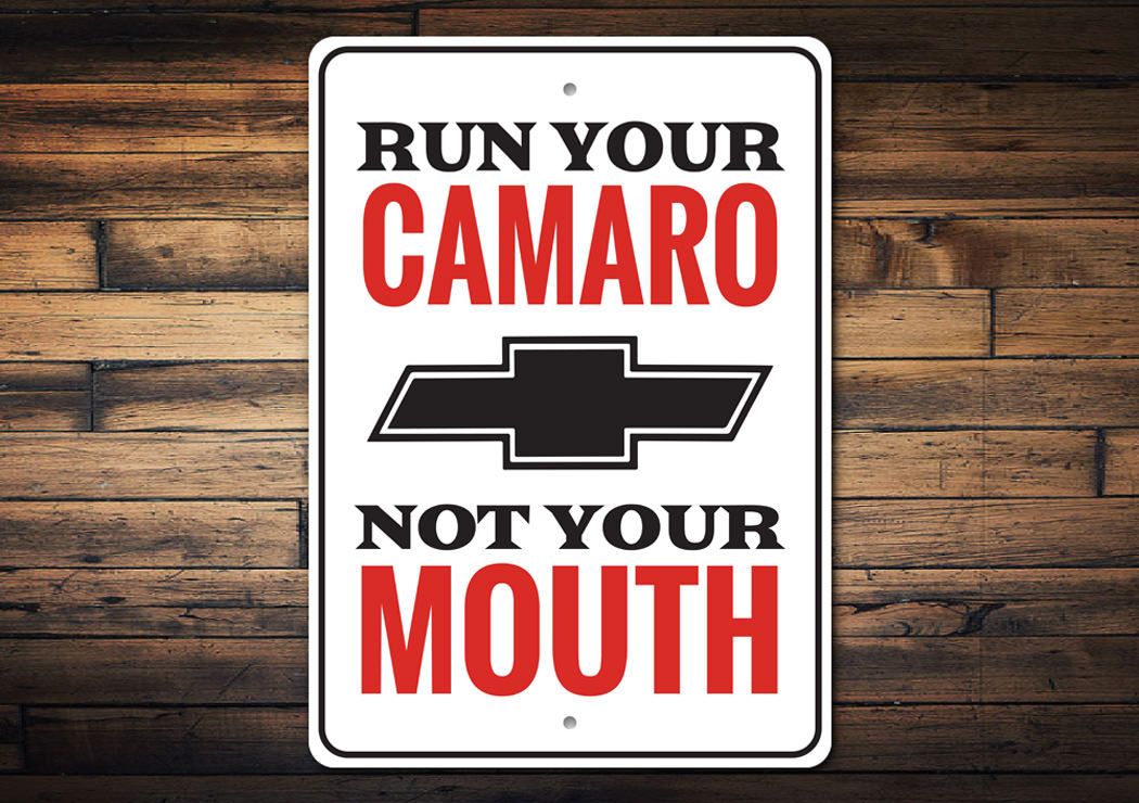 A humorous metal sign featuring a Camaro design, perfect for car enthusiasts, showcasing vibrant colors and quality craftsmanship.