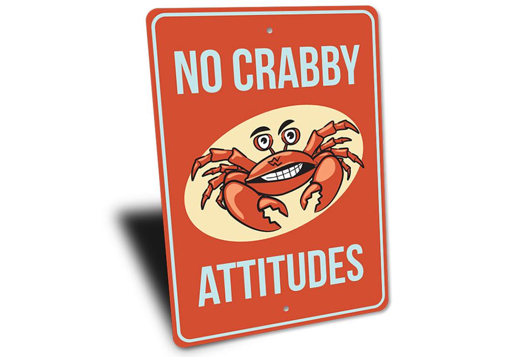 A humorous metal sign featuring a crab design, perfect for beach-themed decor, showcasing vibrant colors and a playful message.