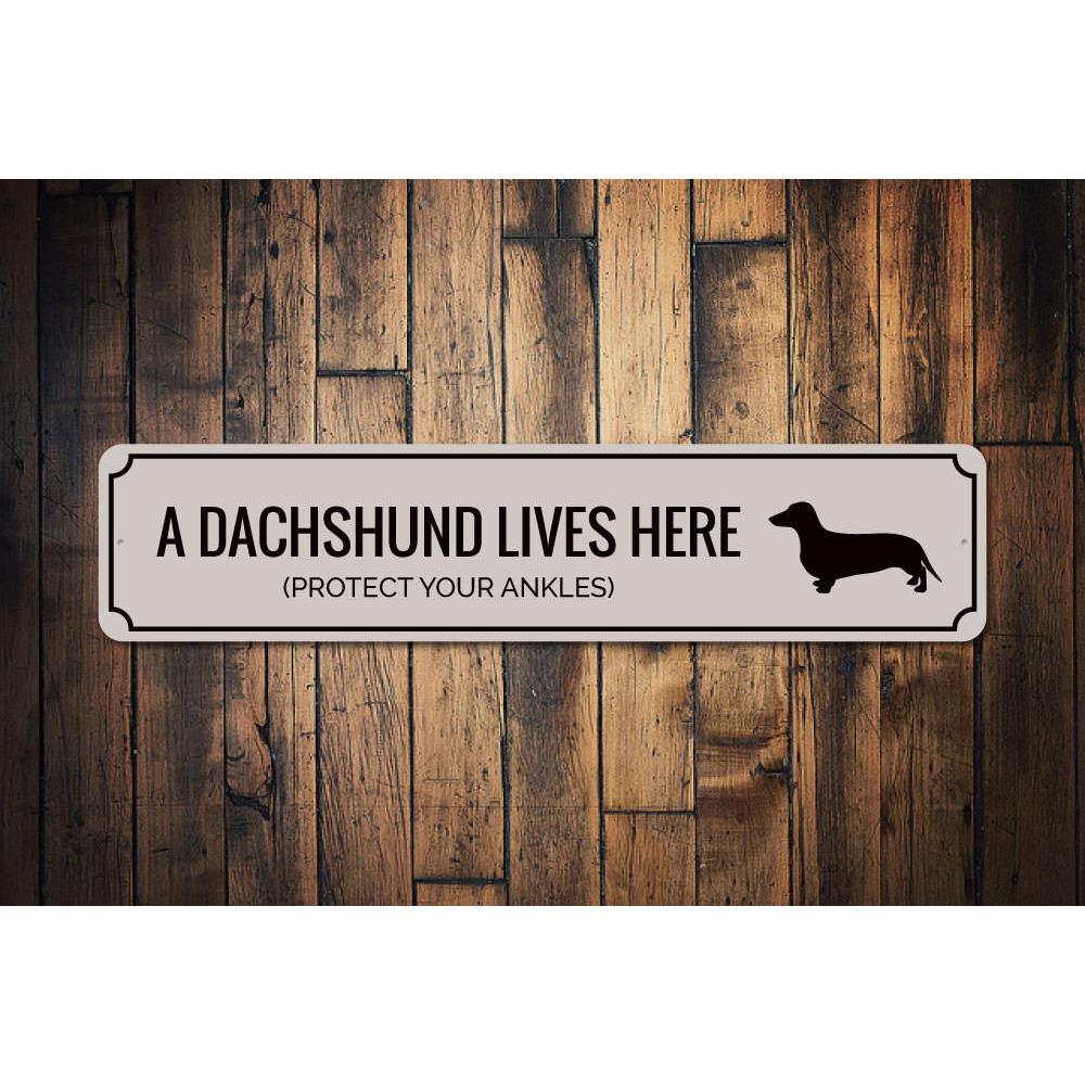 A humorous decorative sign featuring a playful dachshund design, made from high-quality aluminum, perfect for home decor.