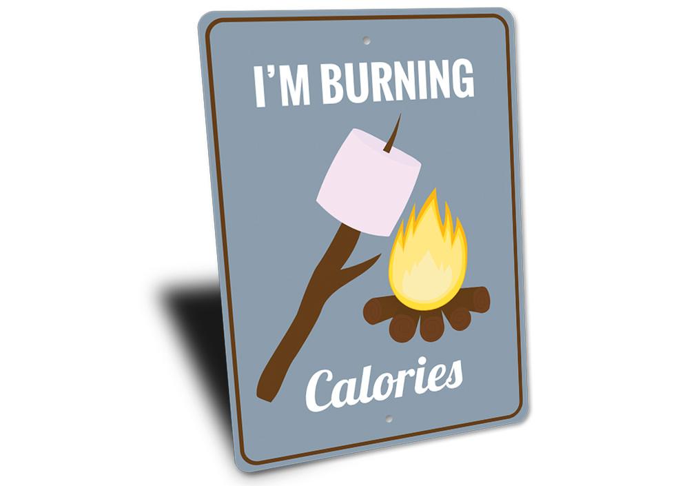 A humorous decorative sign featuring a playful smores design, made from high-quality aluminum, perfect for home decor.