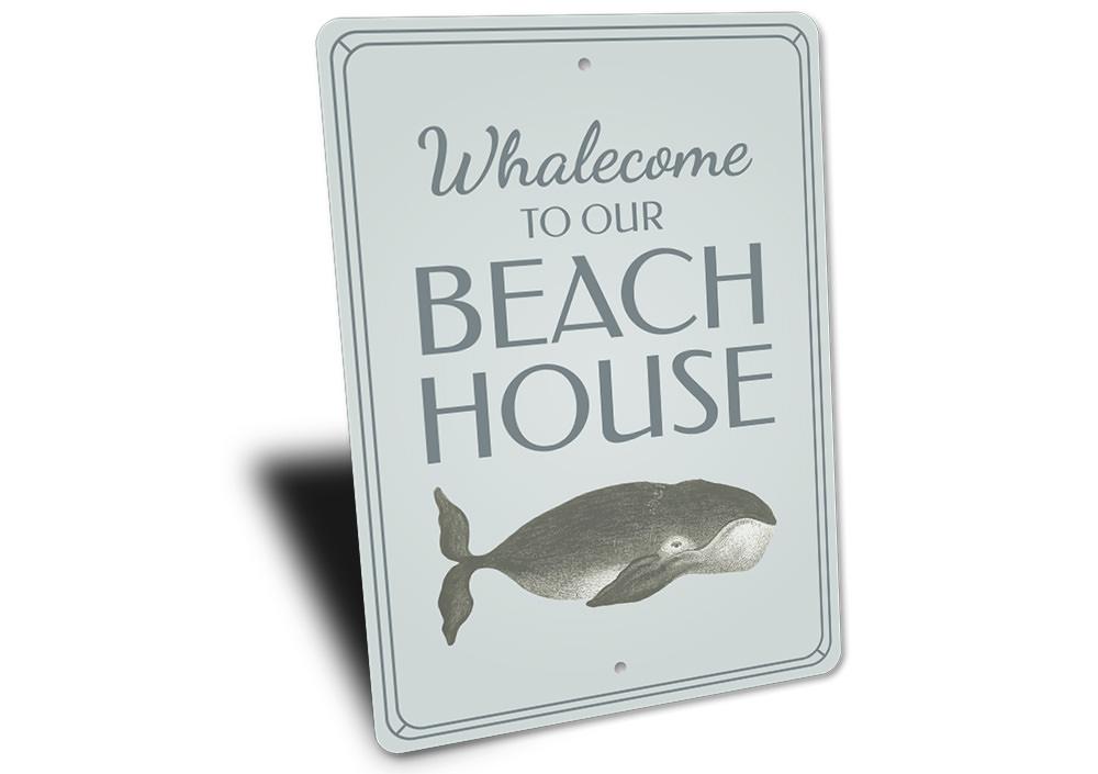 A whimsical Funny Whale Sign made of aluminum, featuring a playful whale design, perfect for beach-themed decor.