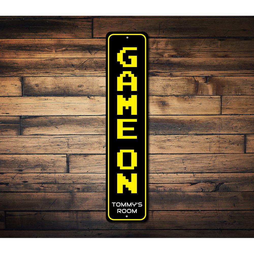 Game On Vertical Sign made of high-quality aluminum, featuring vibrant colors and customizable text, perfect for kids' rooms and game areas.