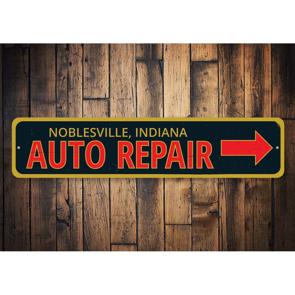 A decorative Garage Auto Repair Sign made of aluminum, featuring customizable text and pre-drilled holes for easy mounting.