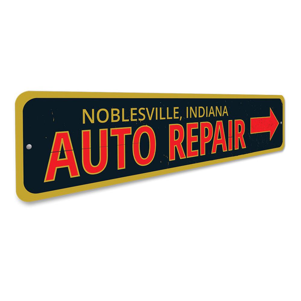 A decorative Garage Auto Repair Sign made of aluminum, featuring customizable text and pre-drilled holes for easy mounting.