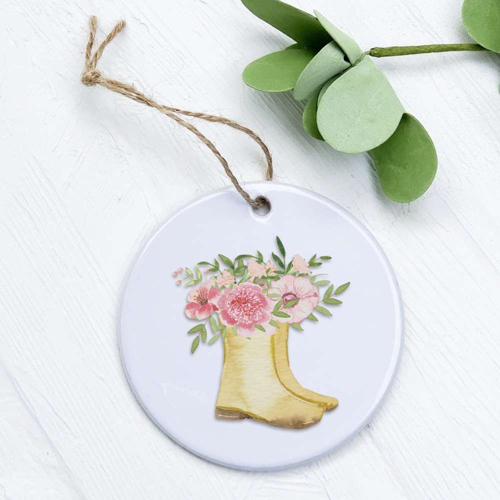 A beautifully crafted porcelain Garden Boots ornament with vibrant designs, perfect for gifting or home decor.