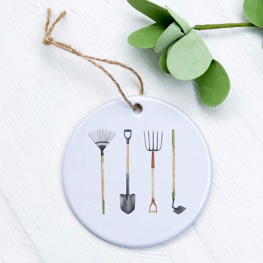 A beautifully crafted porcelain garden tools ornament featuring original designs, perfect for gifting or home decor.