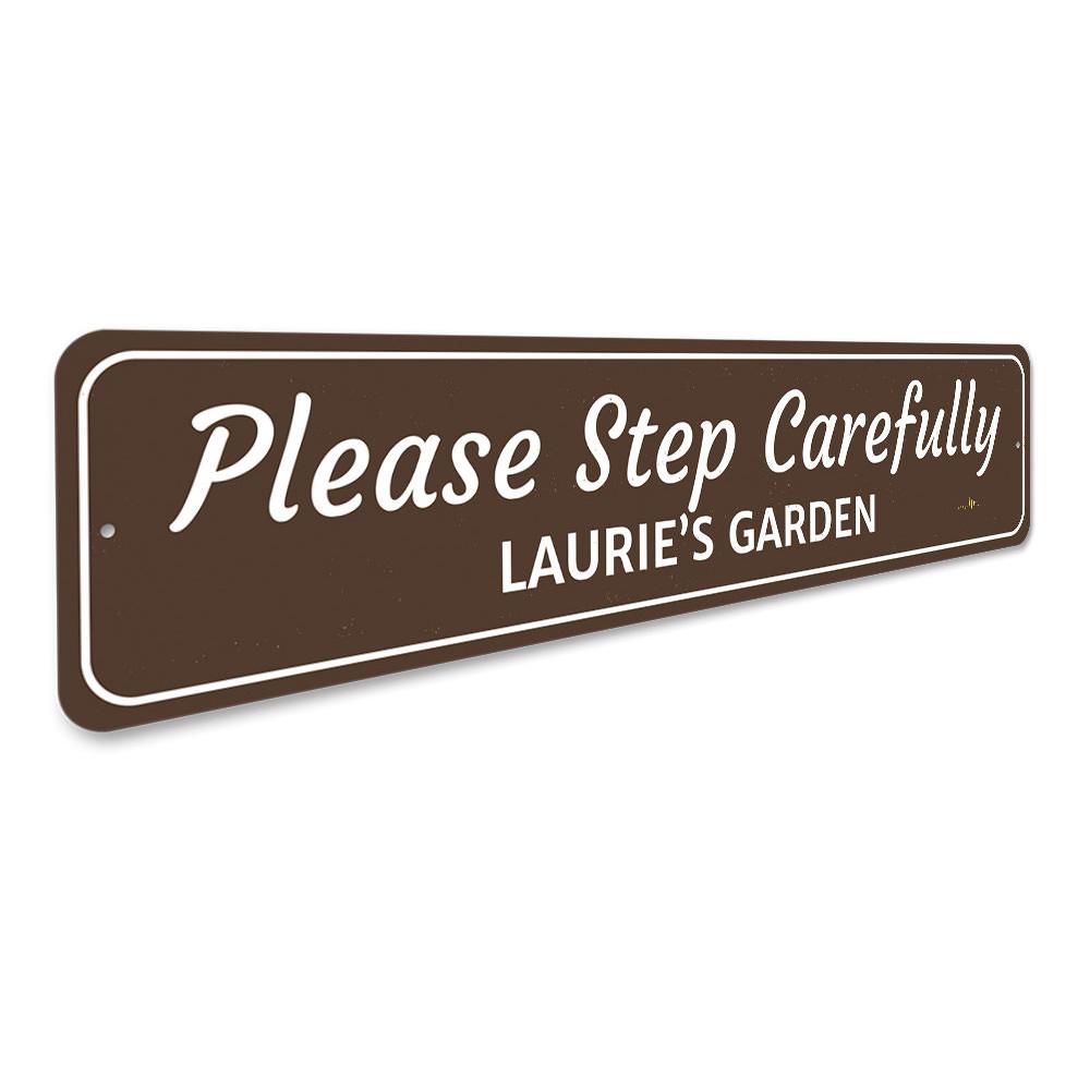 A customizable Garden Warning Sign made of durable aluminum, featuring pre-drilled holes for easy mounting, displayed in a garden setting.