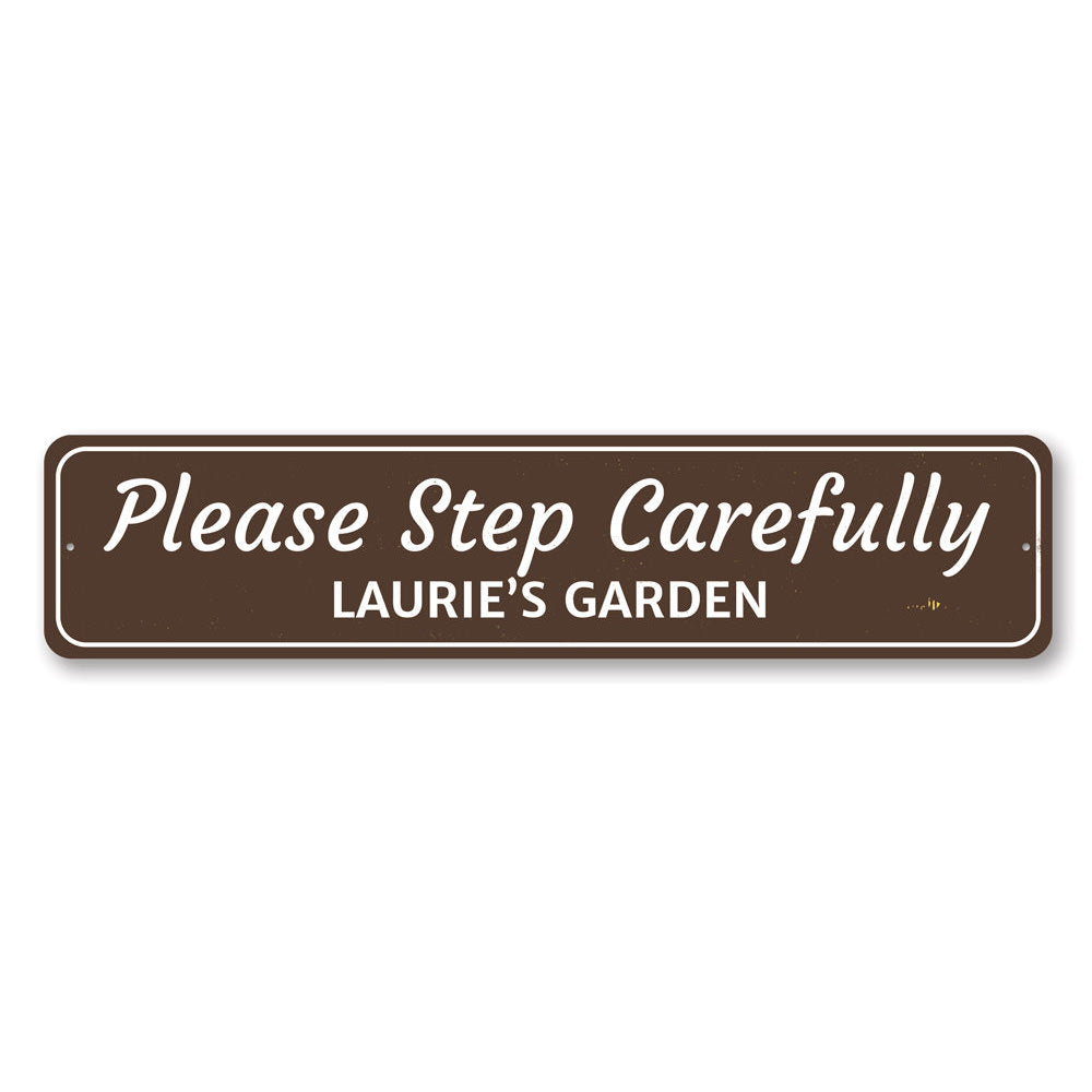 A customizable Garden Warning Sign made of durable aluminum, featuring pre-drilled holes for easy mounting, displayed in a garden setting.