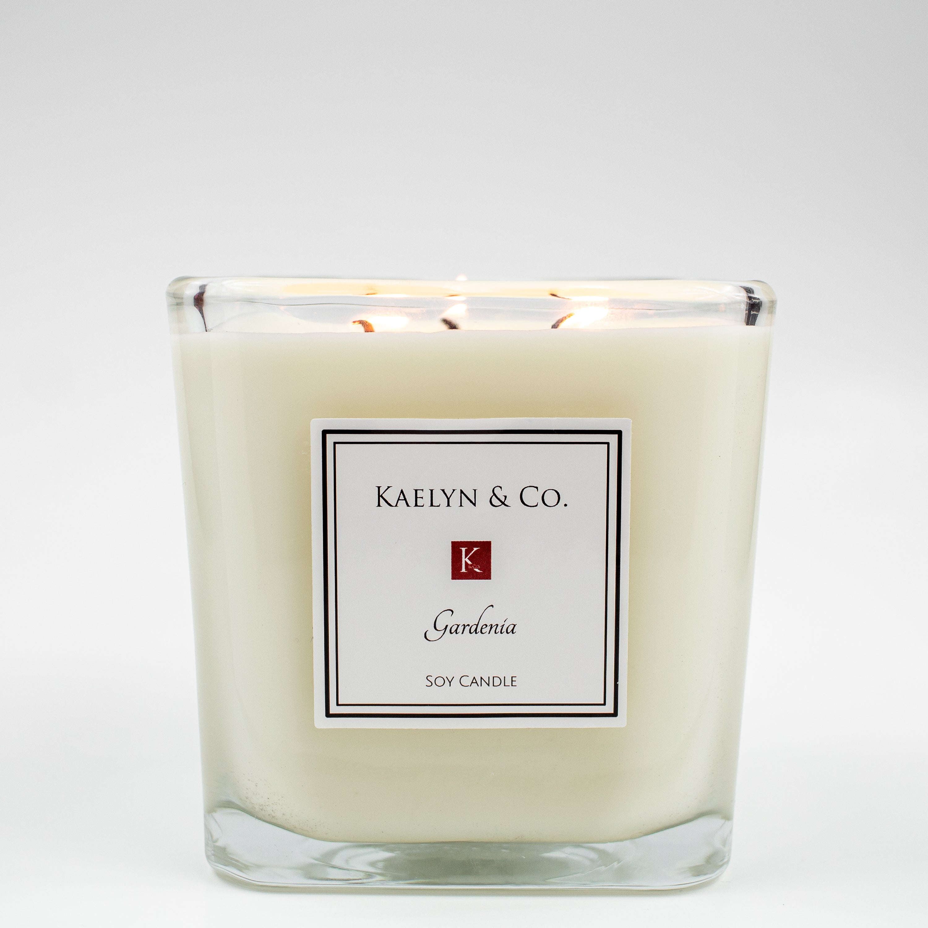 A beautifully crafted Gardenia Large Cube Candle, showcasing its elegant cube shape and soft gardenia flower aroma.