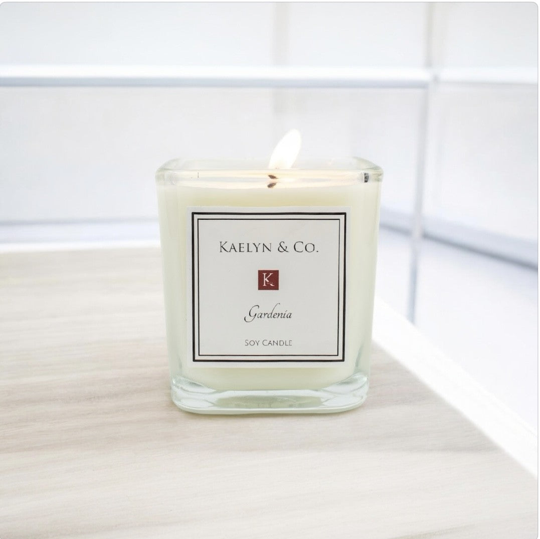 Gardenia Small Cube Candle in elegant packaging, showcasing its soft floral aroma and hand-poured soy wax.