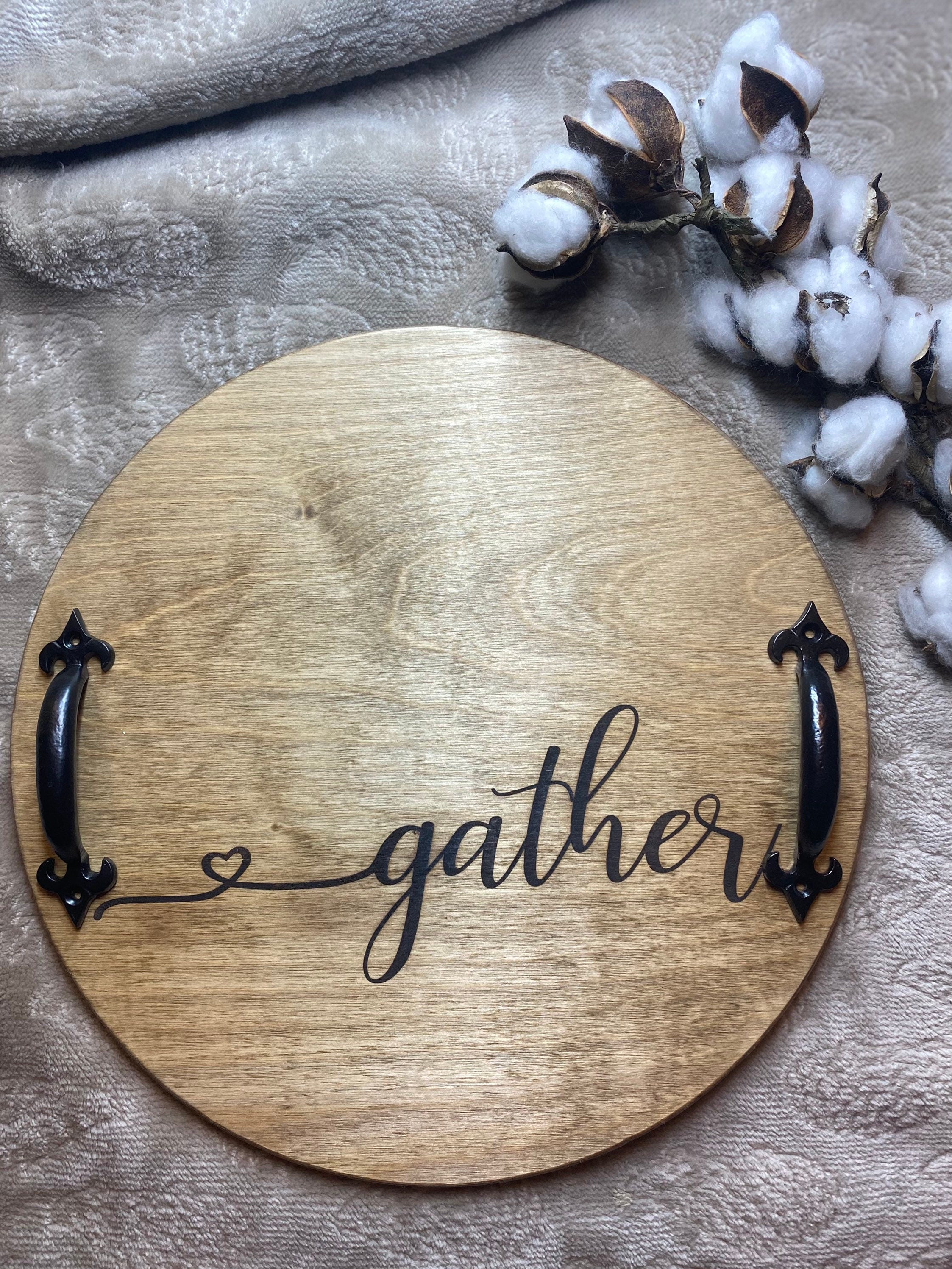 Gather Wooden Serving Tray made of birch plywood with a special walnut stain, featuring black metal handles and unique wood grain patterns.